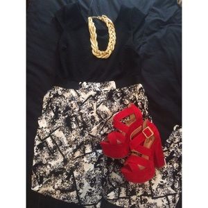 Black and flowery jumpsuit.