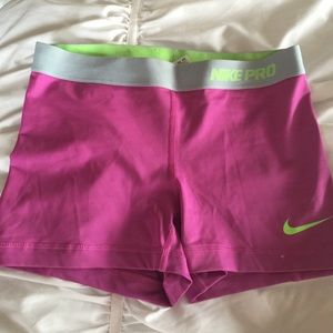 Pink, green and blue nike pro shorts