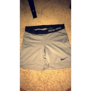 Grey and black nike pros