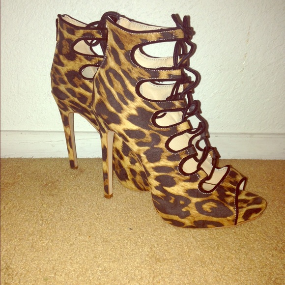 Cheetah print tie up heels ONLY WORN ONCE!