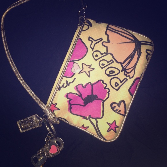 SOLD Coach poppy khaki/floral small clutch