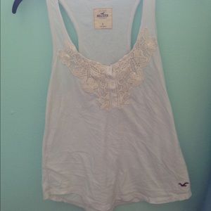 White Hollister tank with lace design at the top