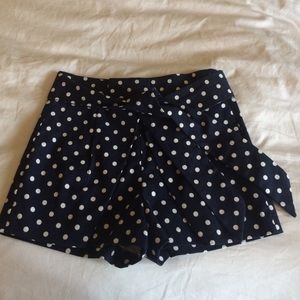 High waisted navy and white polka dot shorts