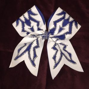 White and blue cheer bow