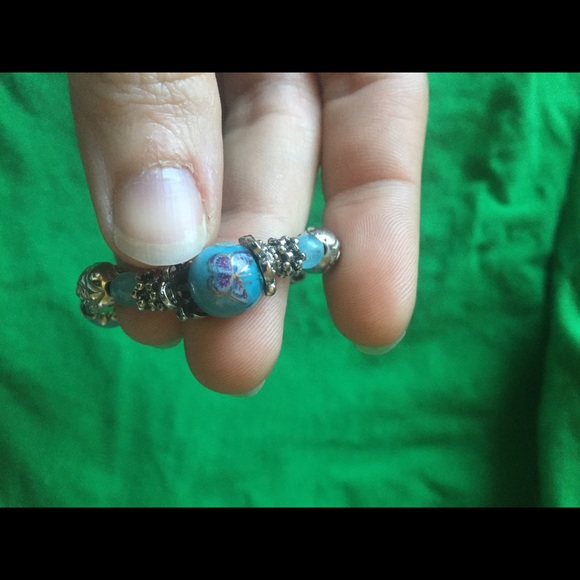 Lovely light blue bracelet with butterflies on it. - Picture 2 of 3