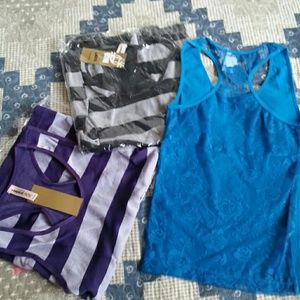 Bundle of brand new muscle shirts!