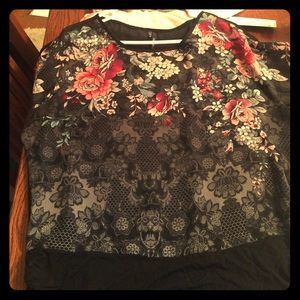 A medium sheer short sleeve top.