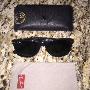 Gently worn black Ray Ban New Wayfarer Sunglasses