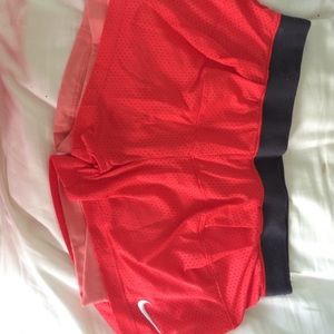 Coral Nike shorts
