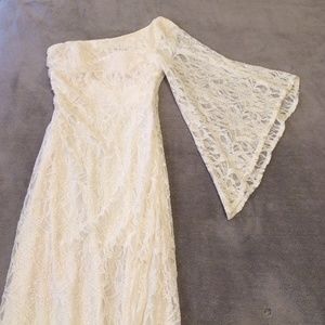 Long,off-white,sparkely, dress. In good condition.