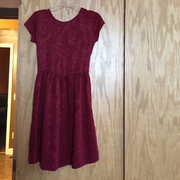 Dark red dress.