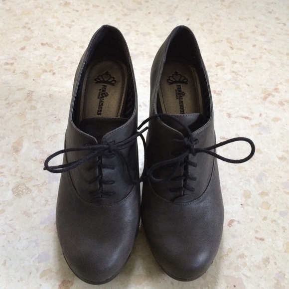 Oxford style bootie heels.