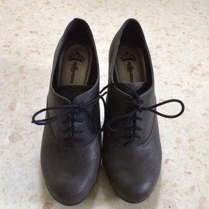 Oxford style bootie heels.