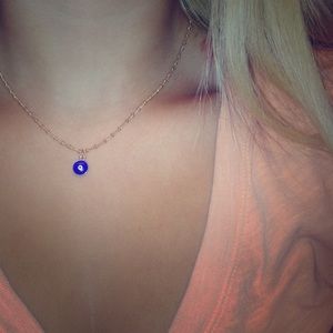 Gold chain with blue and white