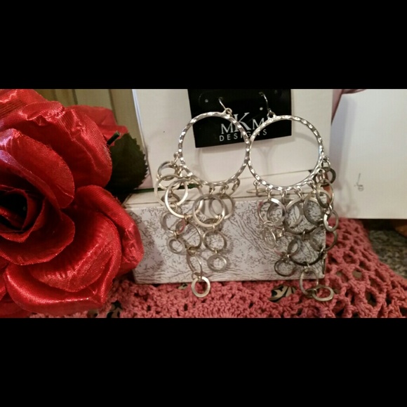 Silver dangle loops long chic earrings.