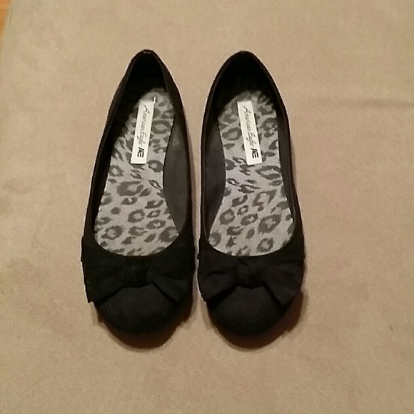 Black suede ballet flats