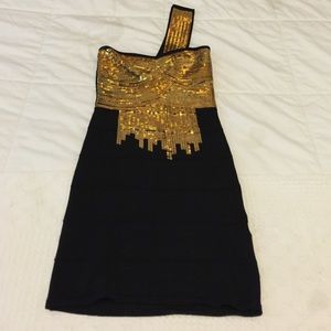 Black and gold bandage dress with sequins