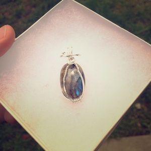 Sterling silver Labordorite cabochon.