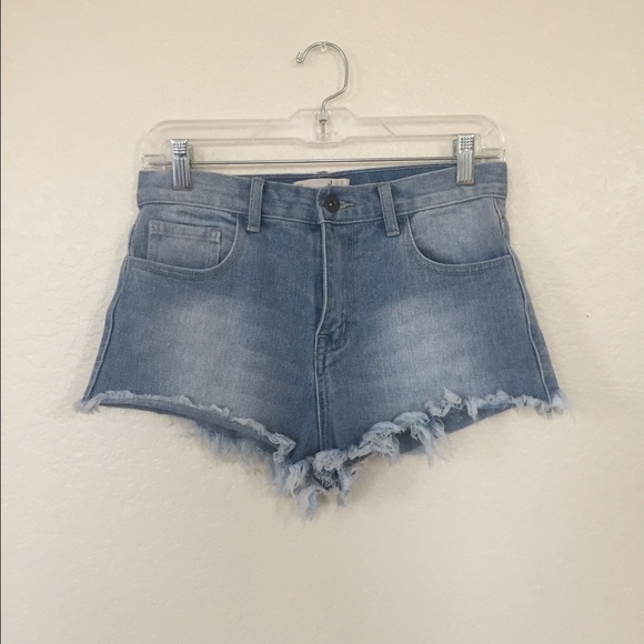 Light-wash blue denim distressed shorts
