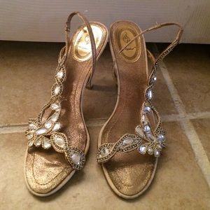 Gold baby phat sandals. 7.5.