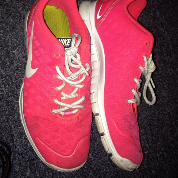 Hot pink nike running shoes