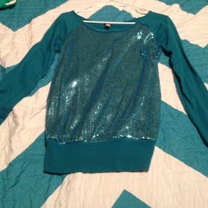 Blue sweater with sequins on the front
