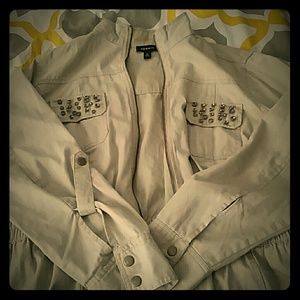 A tan jacket with with peplum shirt& onsie bundle