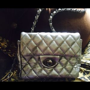 Price cut:NWOT Silver faux leather cross body bag