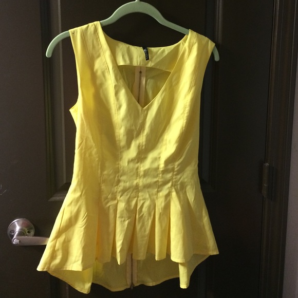 Never work yellow peplum like top from Lulus