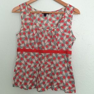 Fitted woven print pleated bodice top