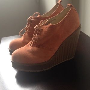 Coral closed toe wedge boots