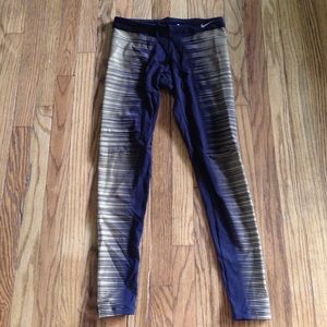 Nike Flash Leggings in Black and Gold