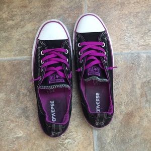 Purple and black converse