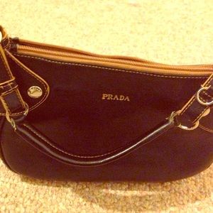 Prada hang bag Black and Tan like new. Unused