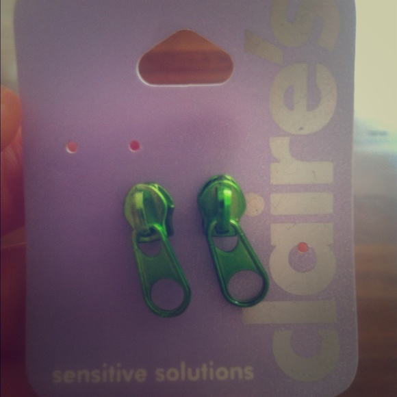 Green zipper earrings.