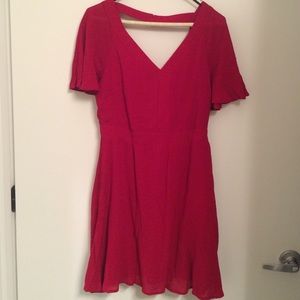 Red flutter sleeve dress