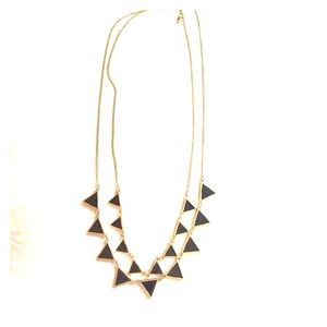 Black and gold colored double strand necklace.