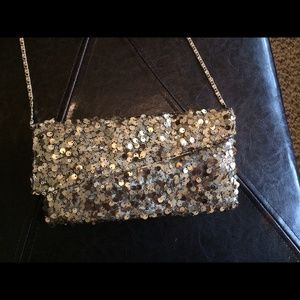 Charming Charlie gold sequin purse.