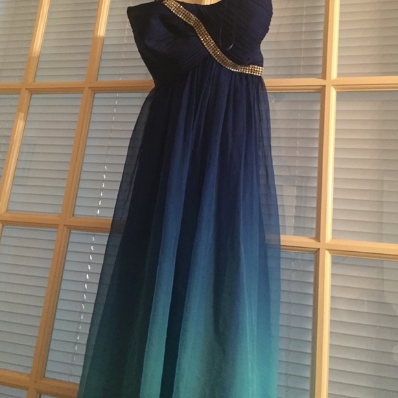 A ombré prom dress worn once.