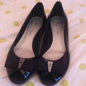 Black low wedge flats