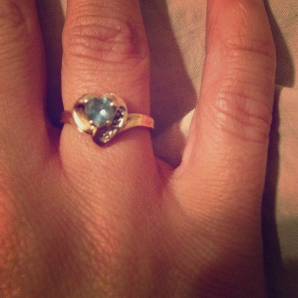 yellow gold heart ring with blue stone