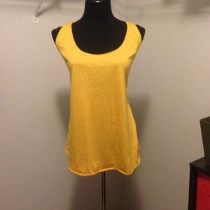 132. Gold tank top