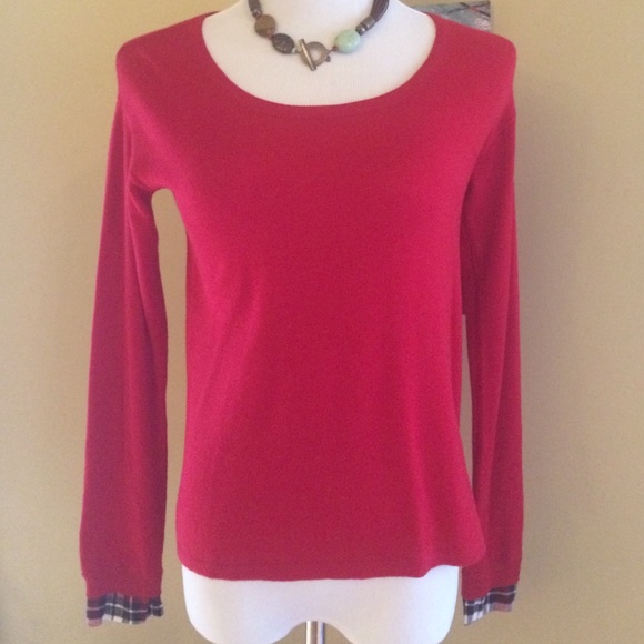 Soft red sweater with plaid sleeve. Like new!