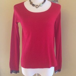 Soft red sweater with plaid sleeve. Like new!