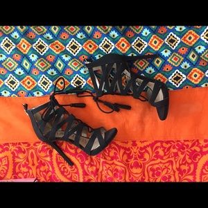 Black lace-up tassel heels