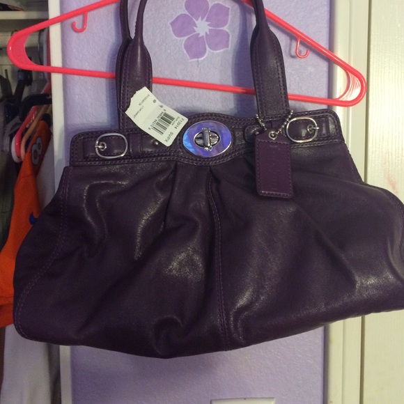 A purple Coach handbag