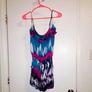 Multi color romper. Worn once.