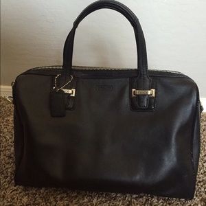 100% Authentic Black leather Coach handbag.