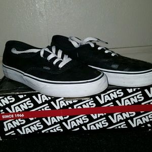 Black and whitr checkered Vanz