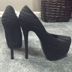 Black stiletto pumps